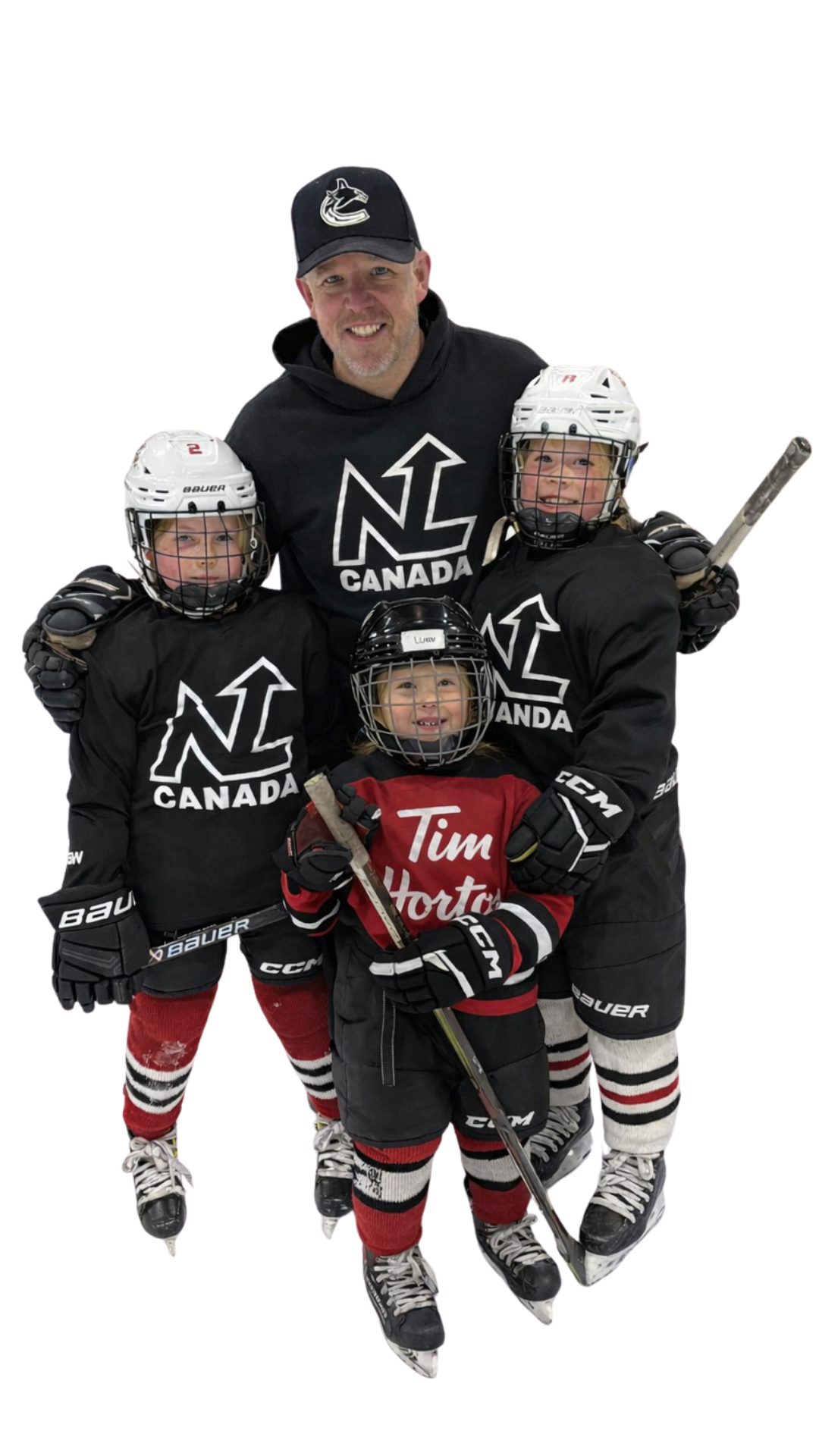 Jon Morrison with his three daughters in hockey gear